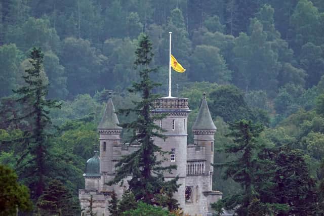 The Royal Banner of Scotland above Balmoral Castle is flown at half mast following the announcement of the death of Queen Elizabeth II.