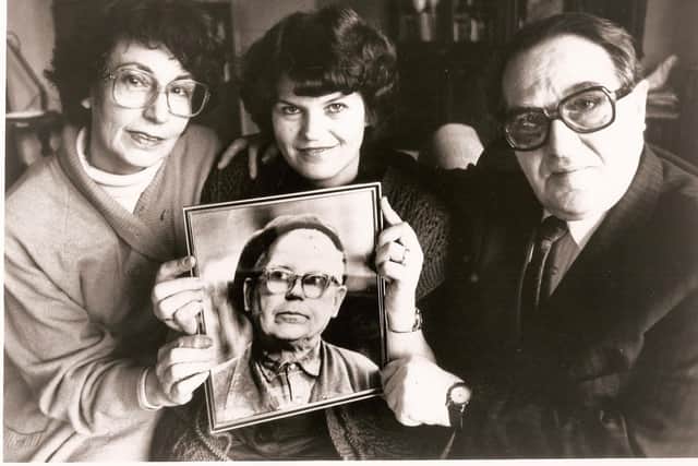 Margaret and Joseph Kagan are pictured here holding a photograph of their saviour, factory foreman Vytautas Rinkevicius, with his daughter Vitalija
