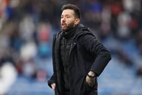 HUDDERSFIELD, ENGLAND - APRIL 22: Carlos Corberan, Manager of Huddrsfield Town looks on during the Sky Bet Championship match between Huddersfield Town and Barnsley at John Smith's Stadium on April 22, 2022 in Huddersfield, England. (Photo by Charlotte Tattersall/Getty Images)