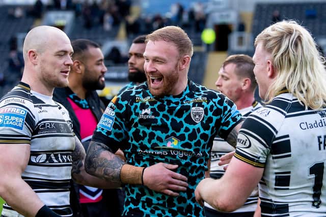 Leigh's Josh Oliver Holmes, is all smiles at full-time, as he talks with beaten Hull FC duo Adam Swift & Brad Fash (Picture: Allan McKenzie/SWPix.com)
