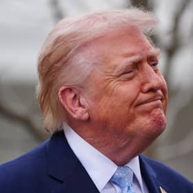 President Donald Trump speaks with reporters. PIC: AP Photo/Alex Brandon