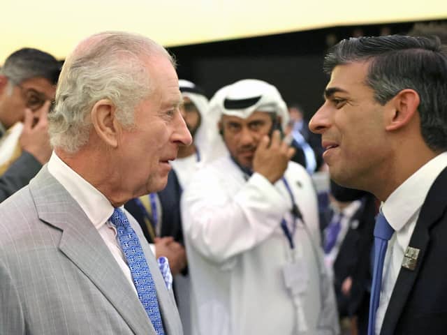 King Charles III (left) speaks with Prime Minister Rishi Sunak as they attend the opening ceremony of the World Climate Action Summit at Cop28 in Dubai. PIC: Chris Jackson/PA Wire