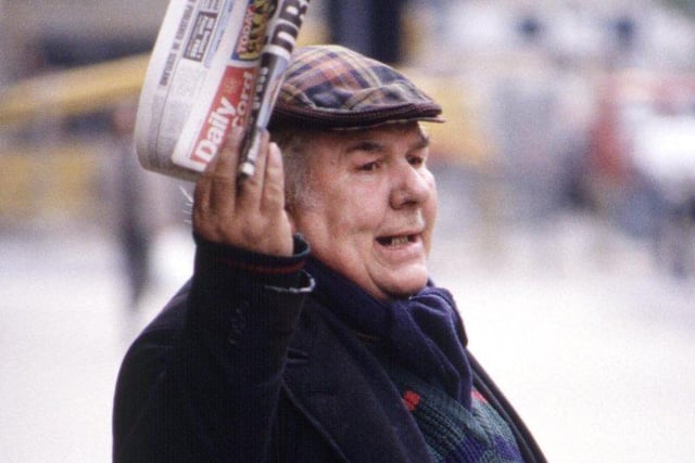 A Glasgow man in a tartan bunnet selling the Daily Record in August 1990.