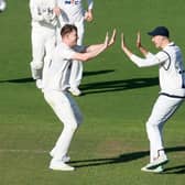Matty Revis, left, celebrates a wicket with his Yorkshire team-mate James Wharton during last season's County Championship game against Glamorgan in Cardiff. Photo by John Heald.