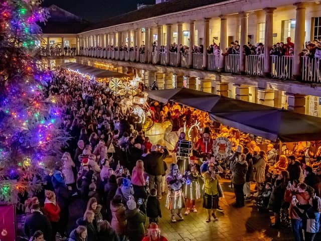 Thousands of visitors flock to see the Illuminated puppets in the Halifax Christmas Parade finish in the Piece Hall photographed for The Yorkshire Post by Tony Johnson