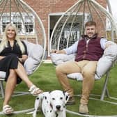 Natalie O’Brien relaxes in the garden of her home at The Greenways with boyfriend George Jensen and their pet Dalmation Oreo. Housebuilder Beal Homes has announced the launch of the next phase of the development. Picture: R&R Studio.