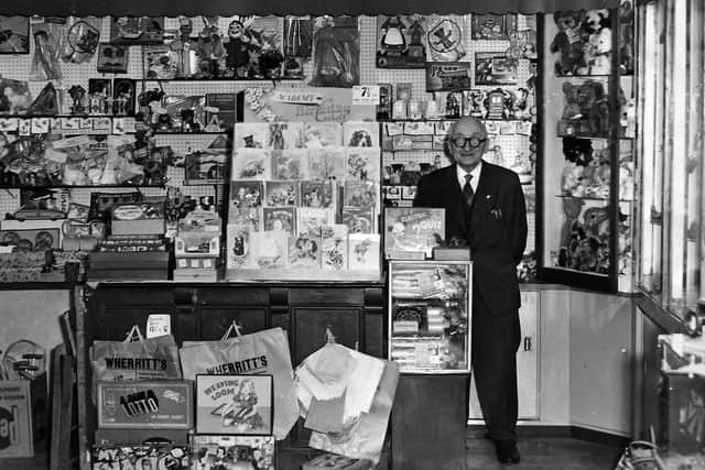 The sisters' grandfather John Wheritt in the gift shop. Picture Jonathan Gawthorpe