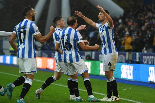 Huddersfield Town's Matty Pearson celebrates opening the scoring in the League One game against Charlton Athletic. Picture: Jonathan Gawthorpe.