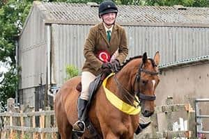 Black Sam Melody has had a busy nine months since she stopped racing and schools, hacks out alone or in company including off-road adventures and to the beach, riding sidesaddle and showing sidesaddle at Equifest, showjumping, winning and taking reserve champion of her section at her first working hunter show.