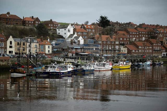 Fishing vessels moored to the quayside in Whitby. (Pic credit: Oli Scarff / AFP via Getty Images)