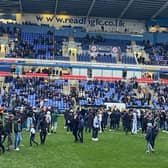 ANGER: Reading fans invade the pitch 16 minutes into Saturday's game against Port Vale