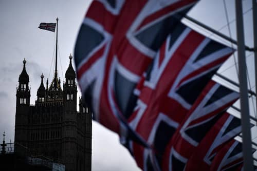 Union flags hang in parliament square on February 1, 2020 in London, England. PIC: Jeff J Mitchell/Getty Images
