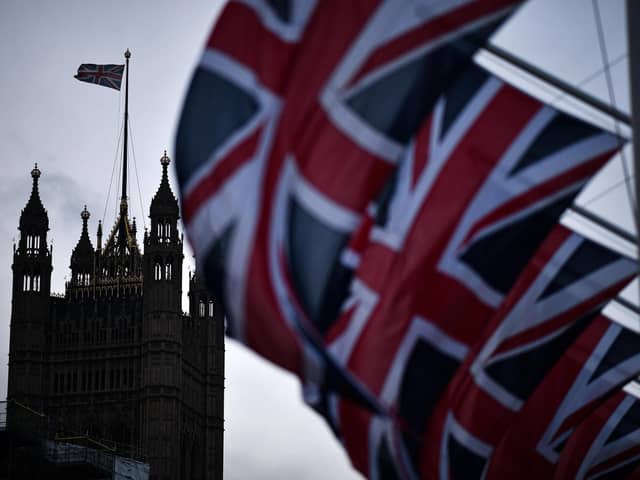 Union flags hang in parliament square on February 1, 2020 in London, England. PIC: Jeff J Mitchell/Getty Images