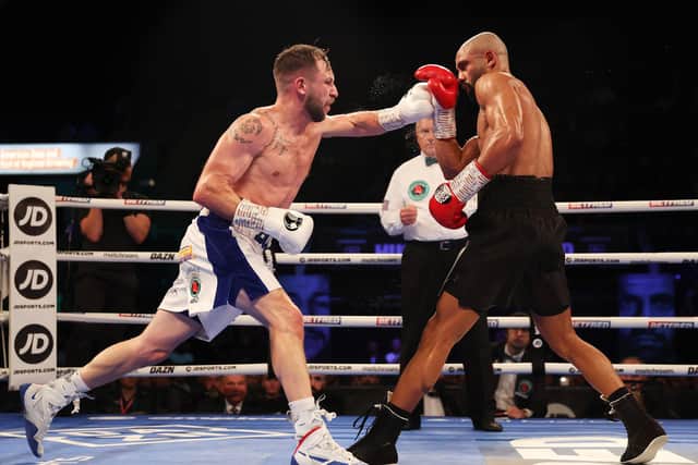 NOTTINGHAM, ENGLAND - SEPTEMBER 24: Maxi Hughes punches Kid Galahad during the IBO World Lightweight title fight between Maxi Hughes and Kid Galahad at Motorpoint Arena Nottingham on September 24, 2022 in Nottingham, England. (Photo by Nathan Stirk/Getty Images)
