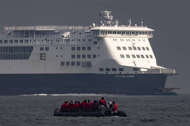 Archive pic: An inflatable craft carrying migrants crosses the shipping lane in the English Channel on August 4, 2022 off the coast of Dover, England. Around 700 migrants crossed the channel from France on Monday, a record for a single day so far this year, bringing the total for 2022 to around 17,000. (Photo by Dan Kitwood/Getty Images)
