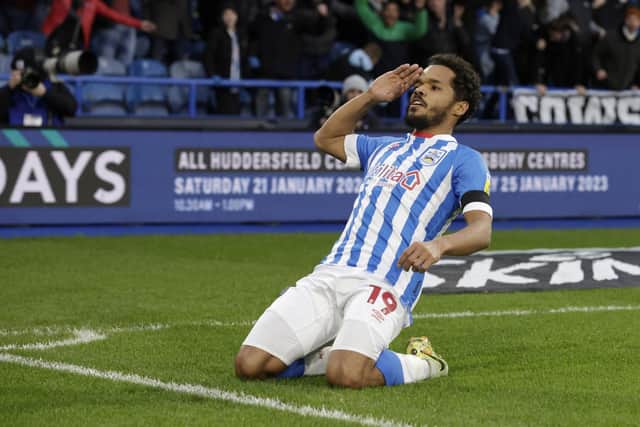 Huddersfield Town's Duane Holmes celebrates after scoring the first goal of the game during the Sky Bet Championship match at the John Smith's Stadium, Huddersfield. Picture: Richard Sellers/PA