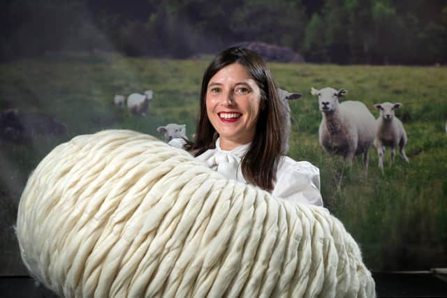 Sarah Turner with a roll of wool she uses to create tumble dryer balls. (Pic credit: Bruce Rollinson)