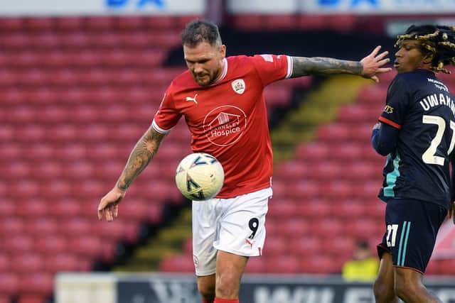 COMEBACK: Barnsley's James Norwood scored one of his team's three late goals to seal a point for Barnsley at Milton Keynes Dons. Picture: Jonathan Gawthorpe