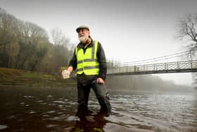 Rick Battarbee test the water for polution on the River Wharfe at Ilkley