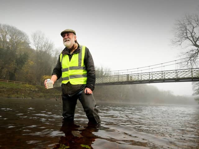 Rick Battarbee test the water for polution on the River Wharfe at Ilkley