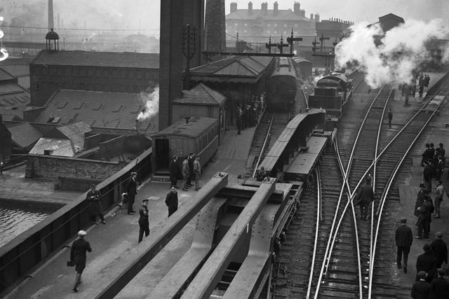 A super-sized goods train of special wagons of the London and North Eastern Railway (LNER) passing through Sheffield Victoria Station in April 1930.