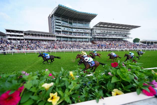 HOME RUN: Devoted Queen ridden by William Buick crossing the line to win the Sky Bet Fillies' Stakes at York . Picture: Mike Egerton/PA