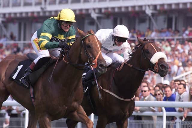 Speed queen: Zuhair ridden by Alex Greaves, left, and trained by Dandy Nicholls, wins the 1999 Stewards' Sprint Stakes at Goodwood. (Picture: FIONA HANSON)