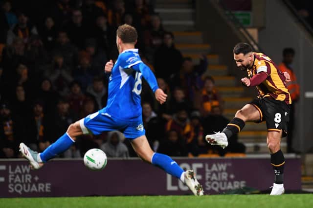 GOAL: Adam Phillips finds the net against Peterborough United (Image: Jonathan Gawthorpe)
