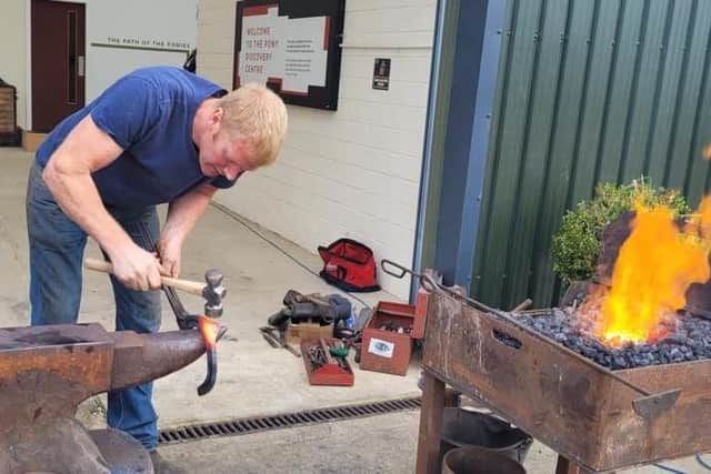 South Yorkshire farrier, Tom Pears, practising for the World Clydesdale Show Shoeing and Shoemaking Championships being held this weekend in Scotland.