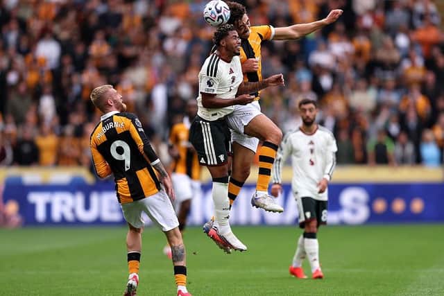 COMBATIVE: Matt Crooks wins a header against Andrey Santos of Manchester United as Oli McBurnie watches on (Image: George Wood/Getty Images)