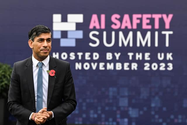 Prime Minister Rishi Sunak speaks to the media as he arrives at the AI safety summit. PIC: Justin Tallis/PA Wire