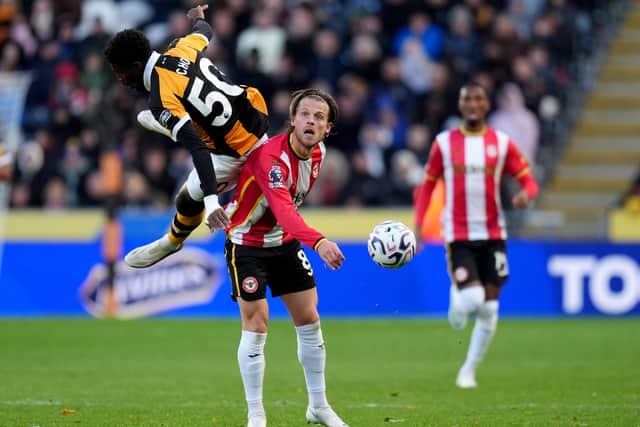 EVEN-HANDED: Hull City's Mohamed-Ali Cho (left) and Brentford's Mathias Jensen battle for the ball at MKM Stadium, Kingston upon Hull. Picture: Annabel Lee-Ellis/PA.