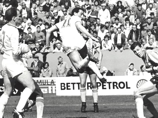 OPENER: David Rennie heads Leeds United in front against Coventry City in the FA Cup semi final at Hillsborough