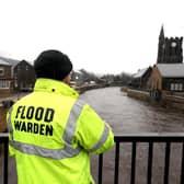 A flood warden looks at the water levels of the River Calder in Mytholmroyd in the Upper Calder Valley in West Yorkshire, in anticipation of Storm Christoph which is set to bring widespread flooding, gales and snow to parts of the UK. (Pic: PA)