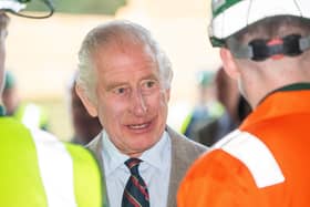 King Charles III meets some of the sawmill staff during a visit to the James Jones and Sons sawmill in Aboyne, Aberdeenshire. PIC: Kami Thomson/DC Thomson/PA Wire