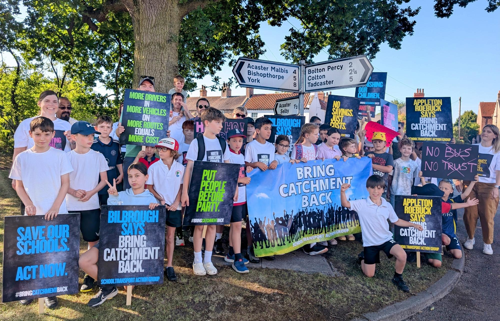 Children and parents protest over school transport policy change