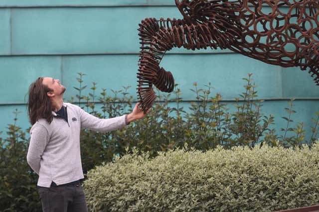 Sculptor Ollie Holman with his Os II sculpture at the Great Yorkshire Showground