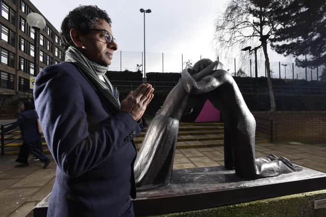 Professor PB Anand, head of Peace Studies at Bradford University, with a bronze statue symbolising the reconciliation of nations ahead of its rededication to mark the 50th anniversary of the renowned Peace Studies department. Copies of the Bradford original reside in the Bundestag in Berlin, Hiroshima, Coventry Cathedral and Stormont, Northern Ireland. Image: Asadour Guzelian