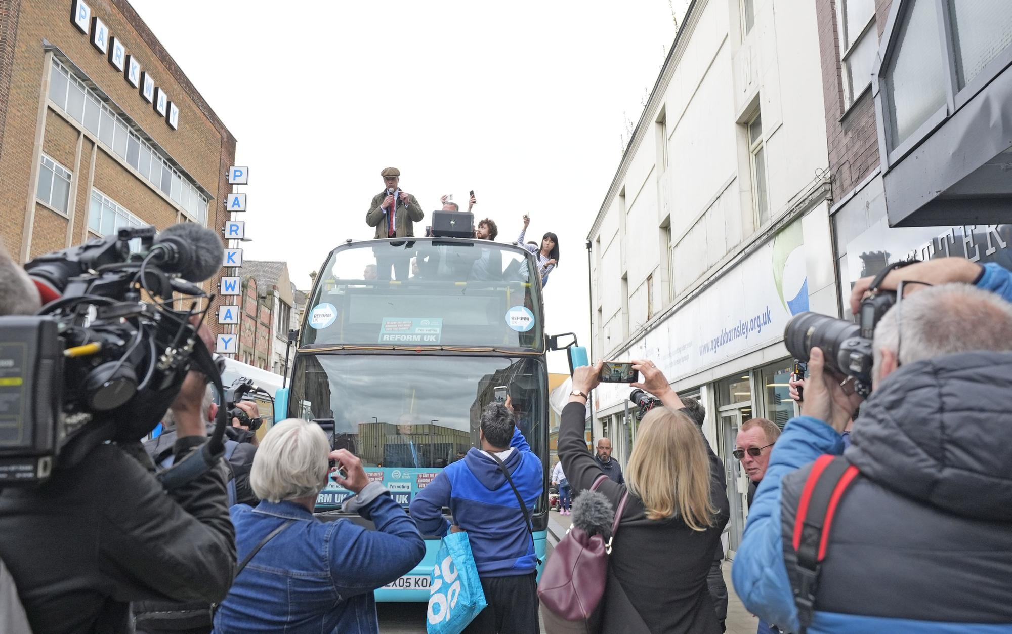 Nigel Farage: Watch moment man appears to throw objects at Reform UK ...