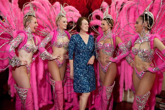 Janet Pharaoh with dancers at the Moulin Rouge