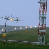 A plane lands at Leeds Bradford Airport Picture Tony Johnson.