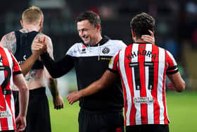 Sheffield United manager Paul Heckingbottom celebrates with goalscorer Reda Khadra after the Sky Bet Championship match at the Swansea.com Stadium, Swansea. Picture: David Davies/PA Wire.