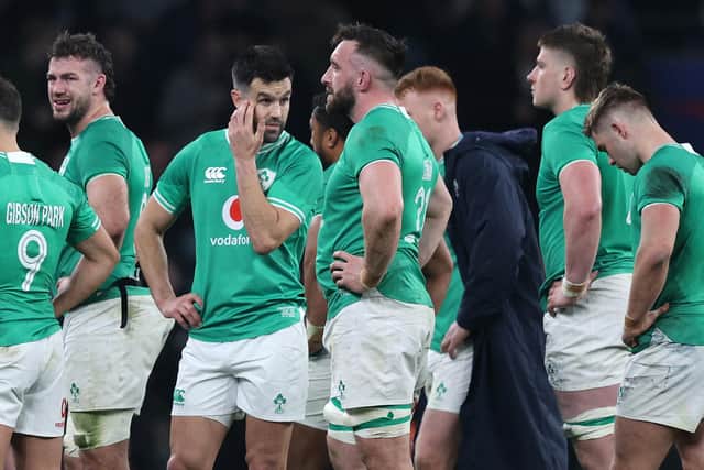 Ireland players react after losing the Six Nations match against England last week but the title is still within their grasp (Picture: ADRIAN DENNIS/AFP via Getty Images)