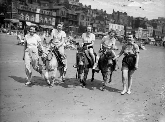 July 1936:  Day trippers on Scarborough Beach.