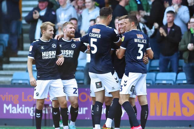 Millwall's Zian Flemming (second right) celebrates after opening the scoring for Millwall. Picture: Rhianna Chadwick/PA Wire.