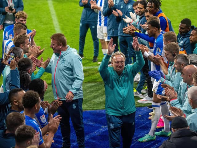 Guard of honour for Huddersfield Town boss Neil Warnock and Ronnie Jepson as they leave the John Smiths Stadium after their final game. Picture: Bruce Rollinson