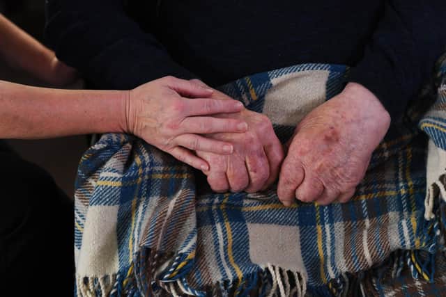 A carer with a resident of the Alba Rose Care Home in Pickering. PIC: Simon Hulme
