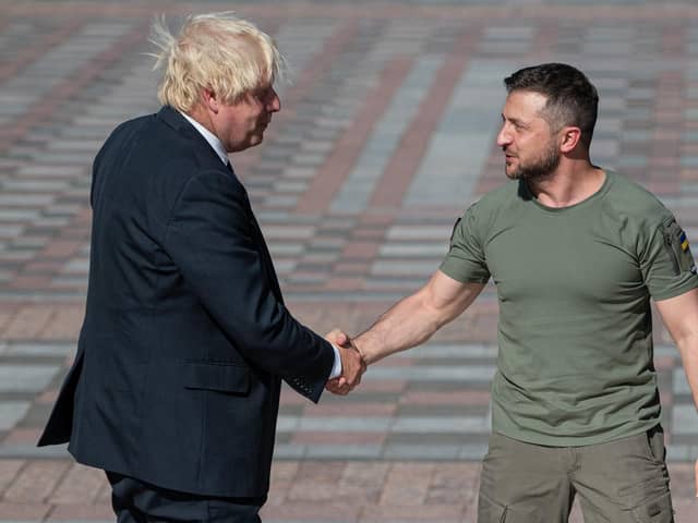 Ukrainian President Volodymyr Zelensky shakes hands with British Prime Minister Boris Johnson on August 24, 2022 in Kyiv, Ukraine. PIC: Alexey Furman/Getty Images