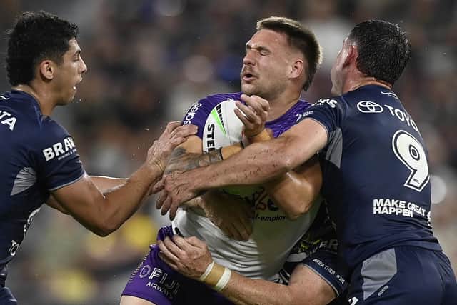 Tristan Powell carries the ball in against North Queensland Cowboys. (Photo: Ian Hitchcock/Getty Images)