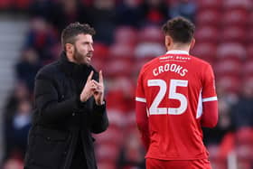 MIDDLESBROUGH, ENGLAND - JANUARY 07: Michael Carrick, Manager of Middlesbrough, talks to Matt Crooks during the Emirates FA Cup Third Round match between Middlesbrough and Brighton & Hove Albion at Riverside Stadium on January 07, 2023 in Middlesbrough, England. (Photo by Stu Forster/Getty Images)